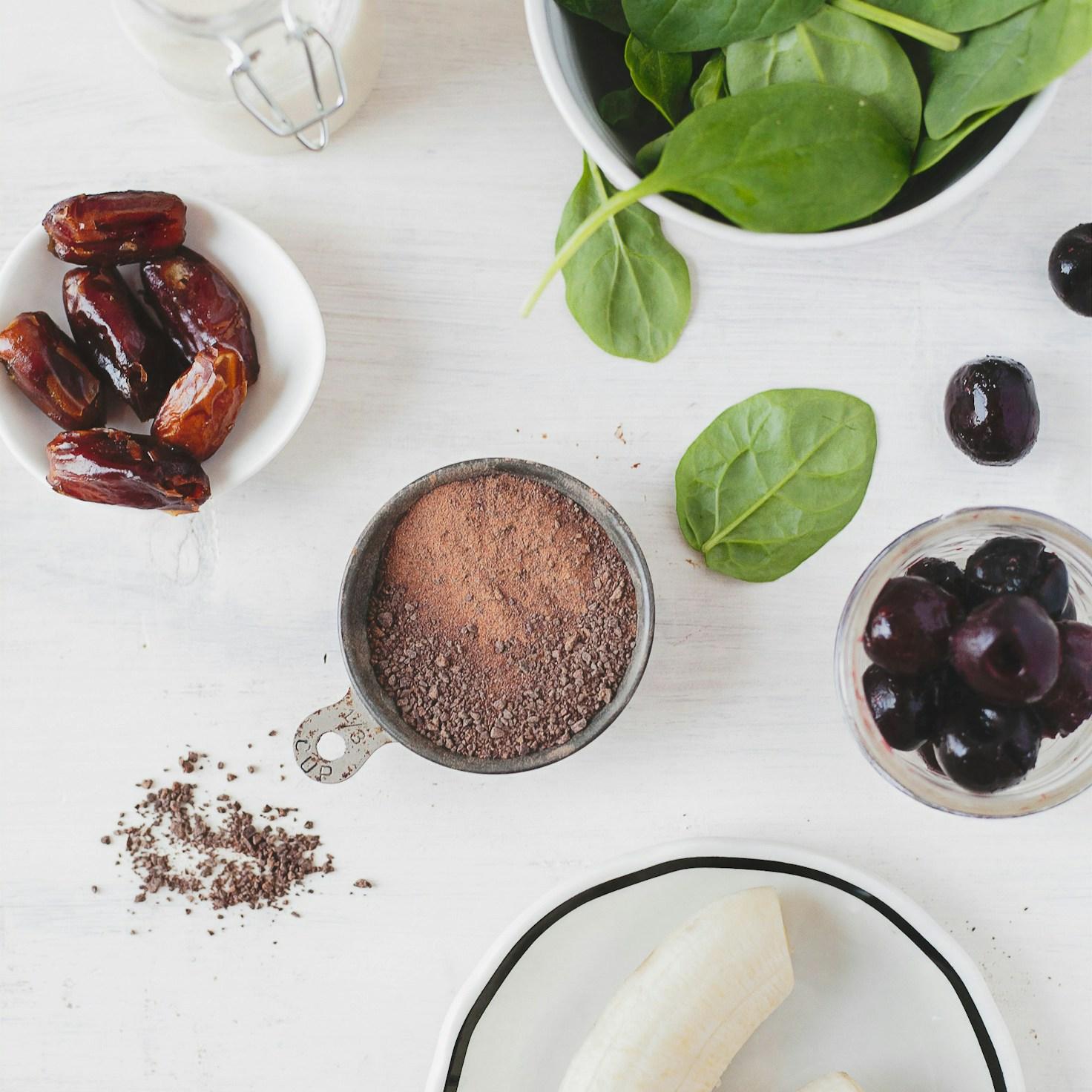 Community members collaborating in a modern kitchen space, sharing recipes and cooking techniques
